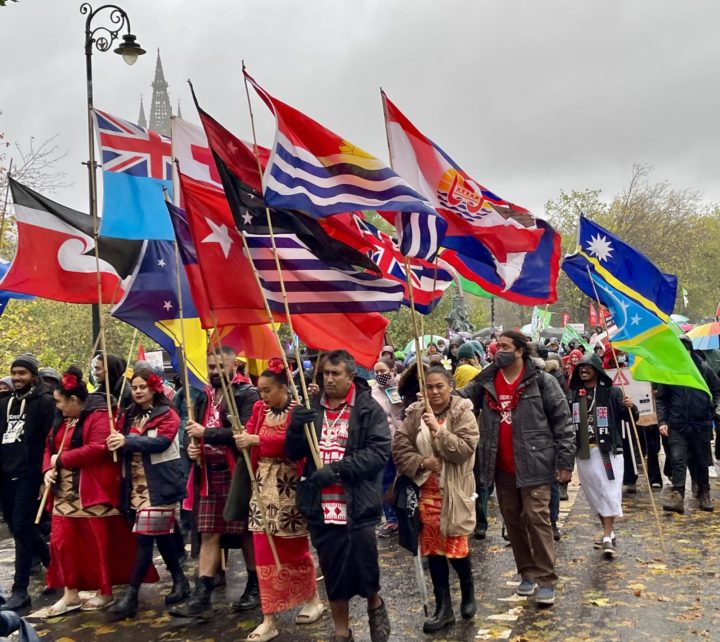 Representatives from small island states demonstrating at COP26