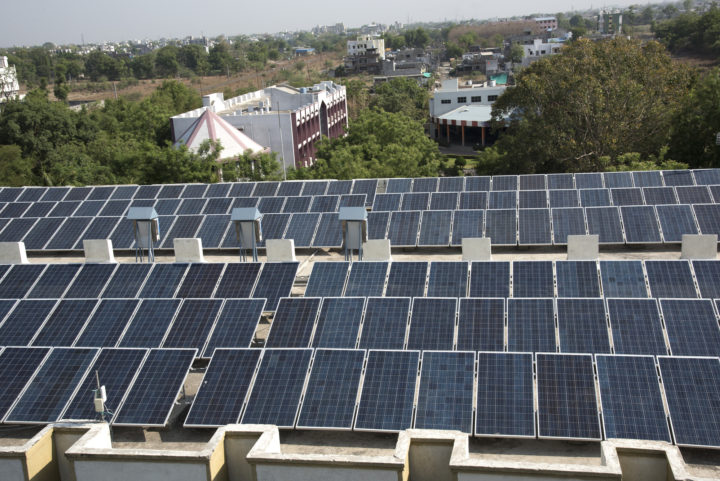 Solar PV on building roof, Maharashtra, India | CRS Photos via Depositphotos